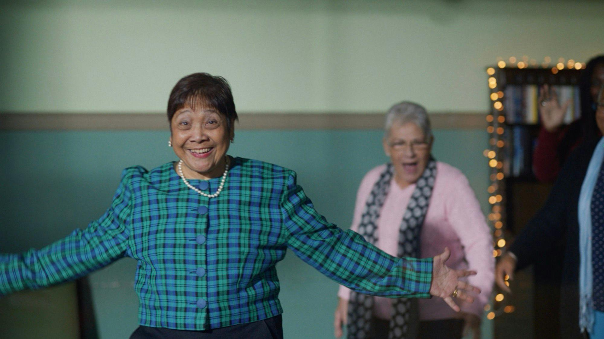 Two smiling elderly ladies as pictured in the second version of the Co-Op campaign.